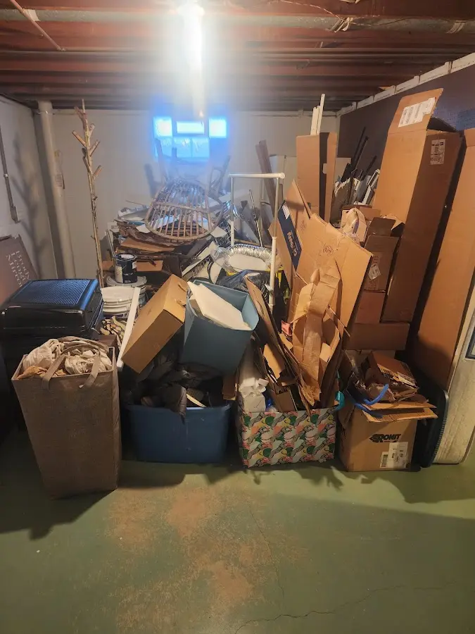 Roll-off dumpster container at job site for Yard Waste Dumpster Rental in Plattsmouth